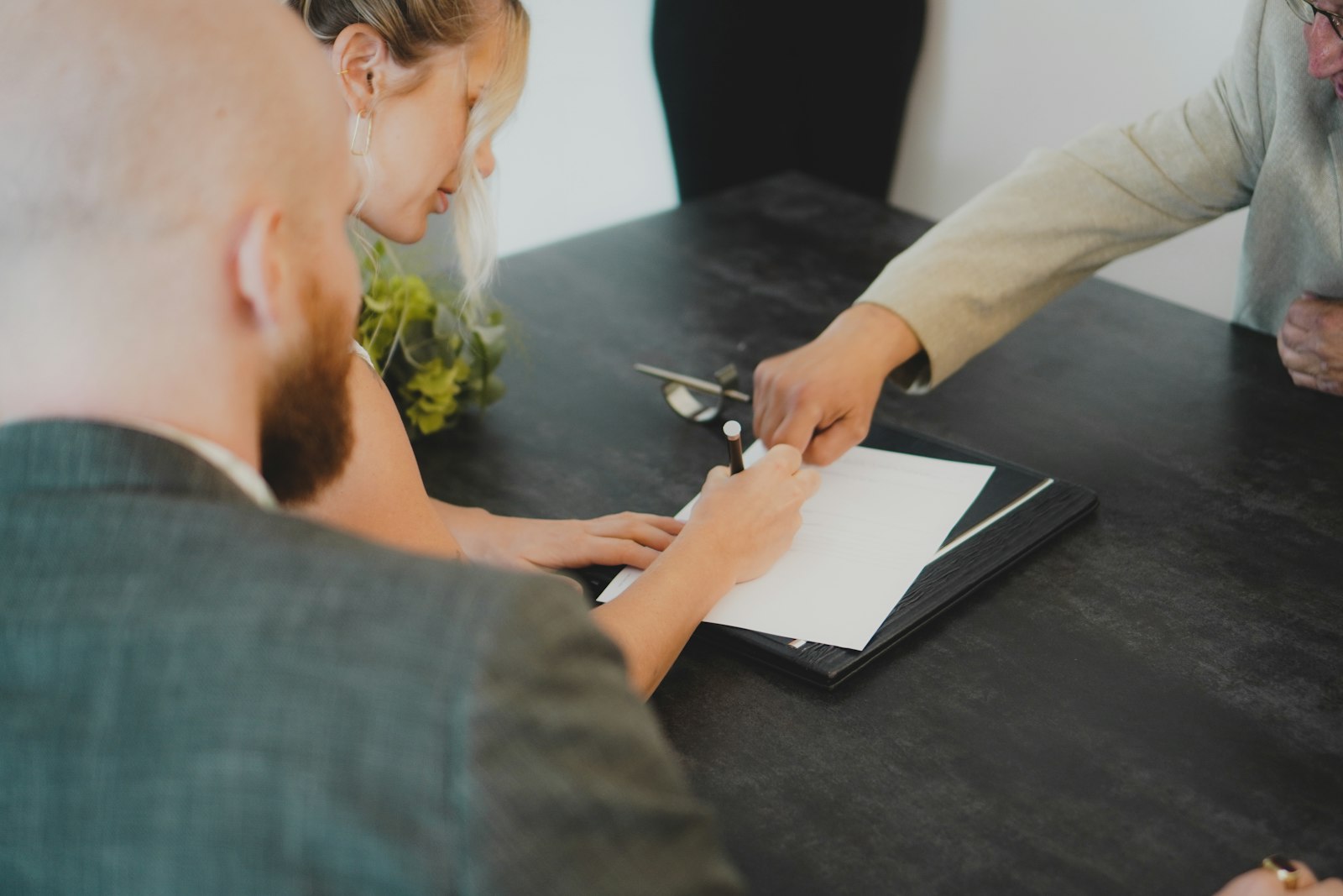 Practice owner and advisor negotiating a medical office lease at a conference table