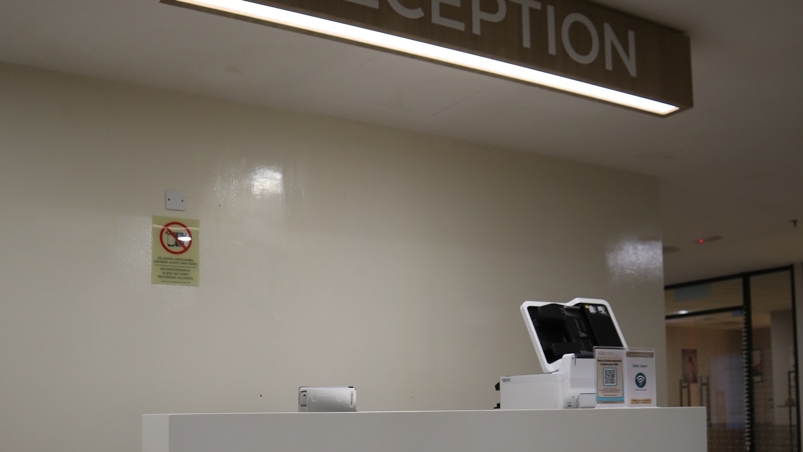 Front desk reception at a medical practice where streamlined check-in helps reduce patient wait times