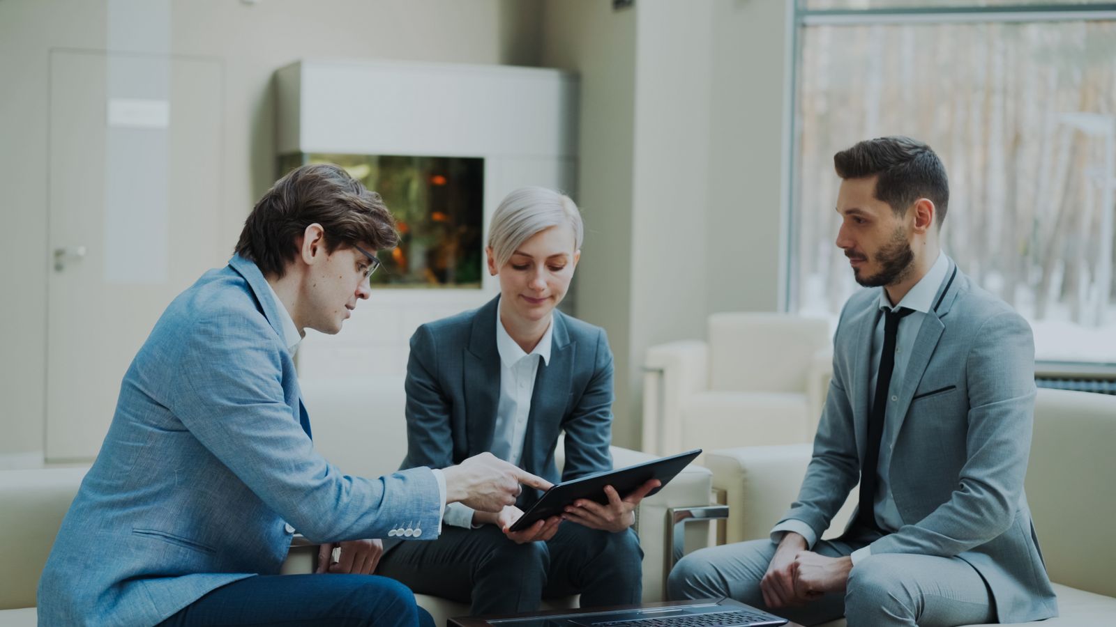 Practice leaders reviewing payer mix findings before a payer contract negotiation